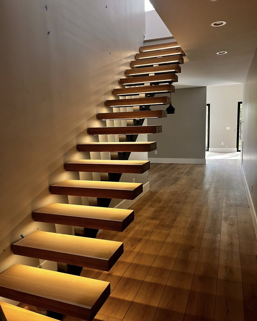 Custom steel and wood stair treads fabricated by BAMPRO